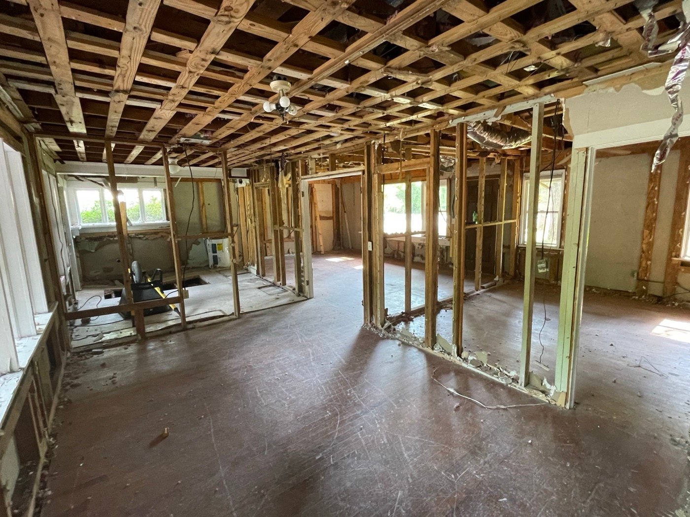 Interior gutted to the studs, with exposed ceiling framing